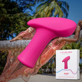 Displayed against a tropical backdrop with palm trees is the Lovense Ambi Bluetooth-Controlled Bullet Vibrator, compatible with the Lovense App. A woman in colorful attire lounges on a palm tree, while the product box showcasing this Bluetooth vibrator by Lovense is visible in the foreground.
